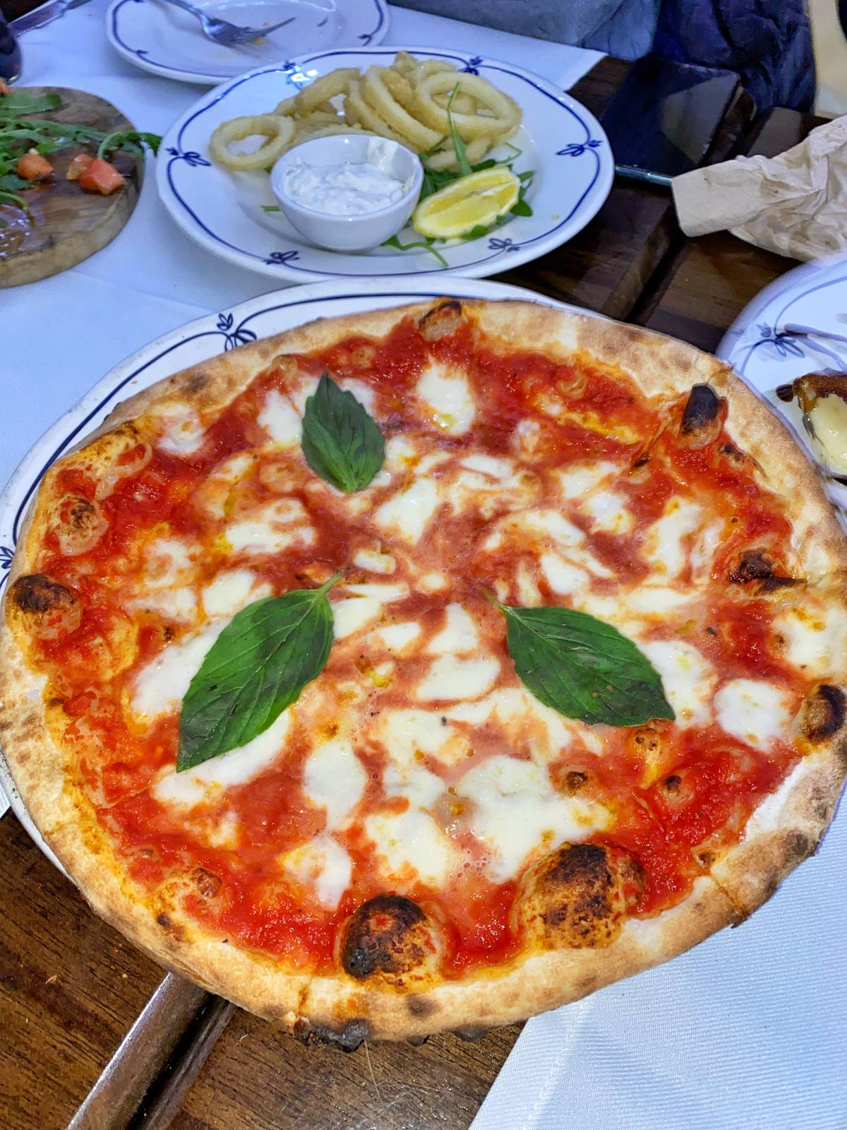 Wood-fired pizza with mozzarella and basil at La Pergola in Harlton, near Cambridge